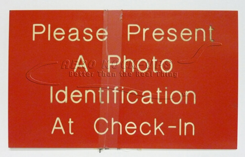 Sign - Present Photo ID