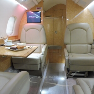 Learjet 60 club chairs - table extended and dressed