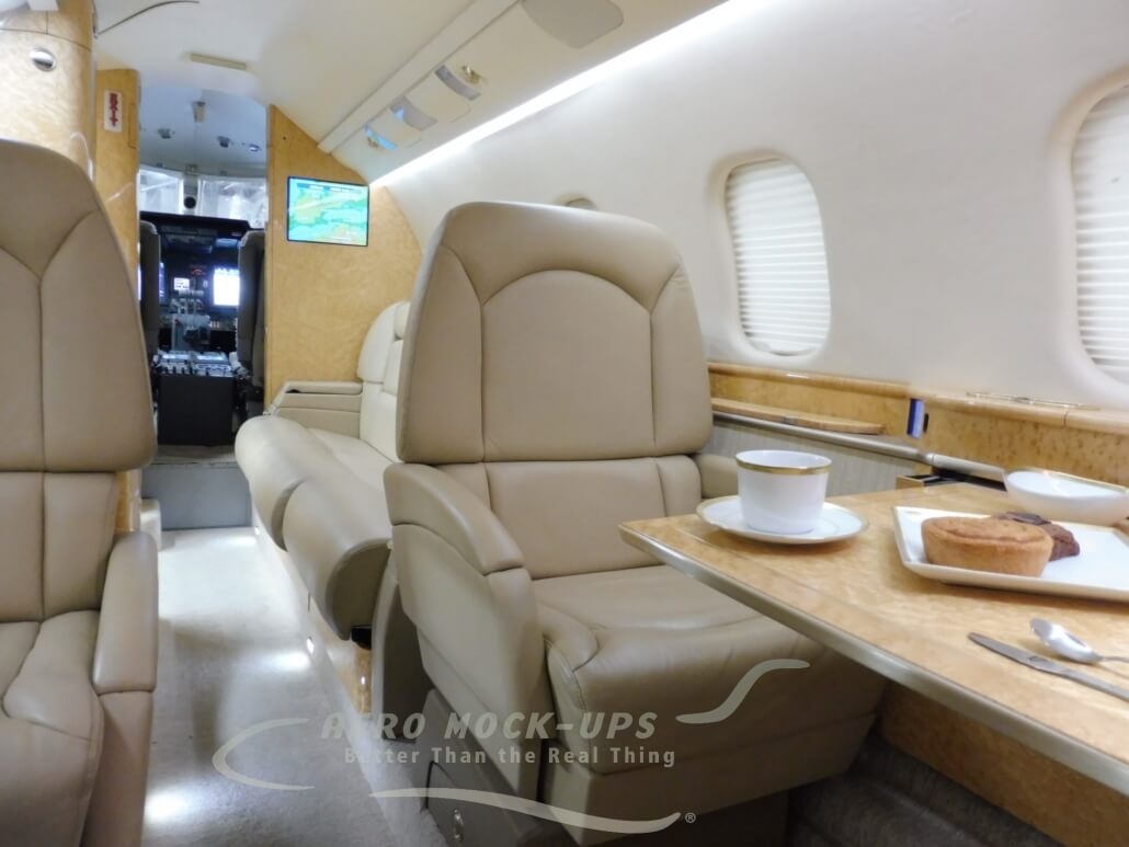 Learjet 60 fwd club chairs, sofa and cockpit